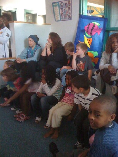 File:Watching other children do a play at a Reading Night.jpg